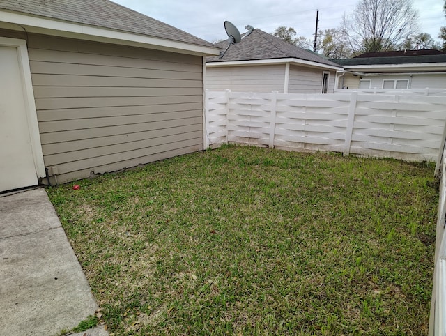 view of yard featuring fence