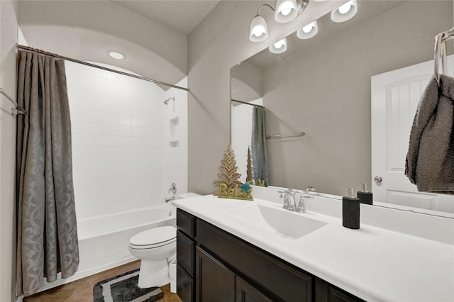 full bathroom featuring toilet, shower / bath combination with curtain, tile patterned flooring, and vanity