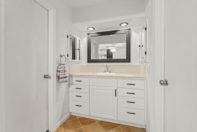 bathroom with tile patterned floors and vanity