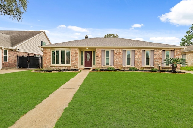 ranch-style home with a front yard