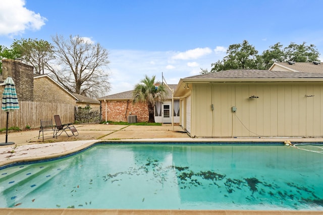 view of pool with central AC