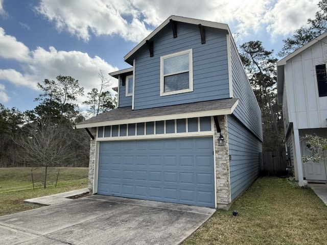 exterior space with a garage and a yard