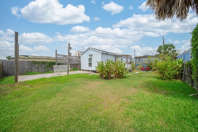 view of yard with a pergola