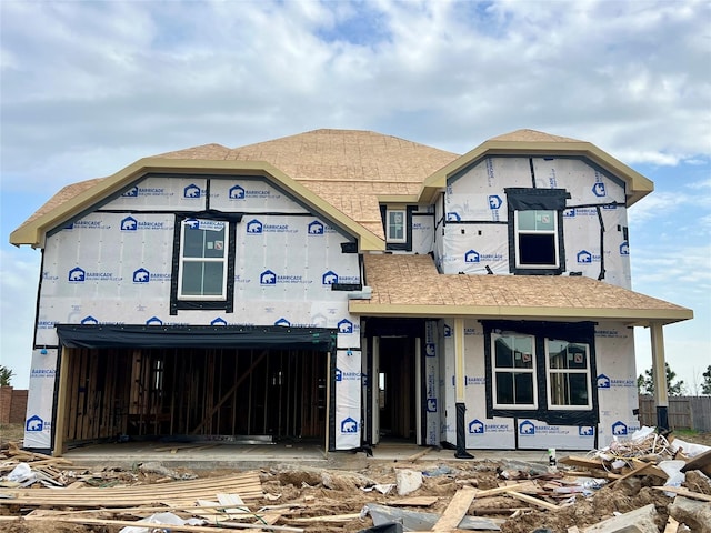 property in mid-construction with an attached garage