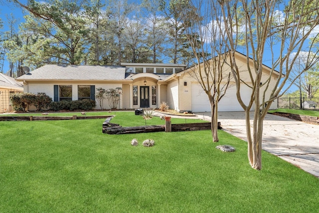 view of front of house with a front lawn and a garage