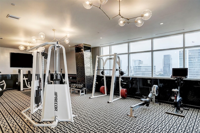 exercise room with carpet flooring