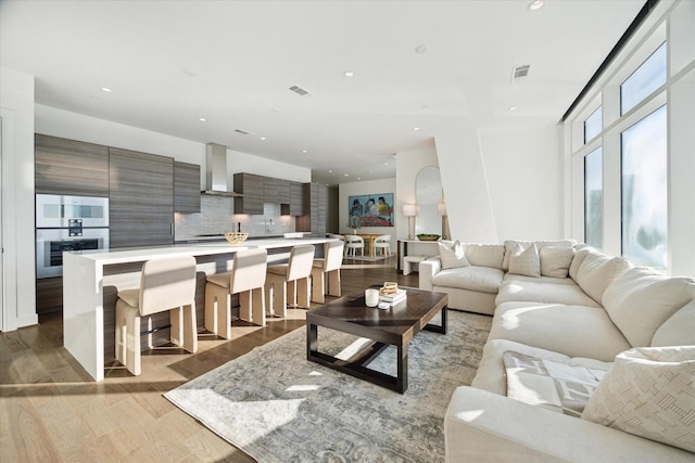 living room featuring light hardwood / wood-style floors