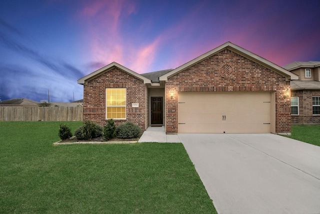 ranch-style house with driveway, an attached garage, fence, a front lawn, and brick siding