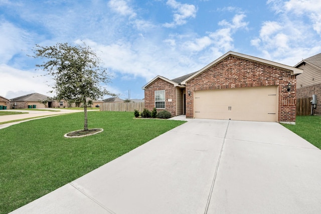 ranch-style house with a front yard, fence, concrete driveway, and brick siding