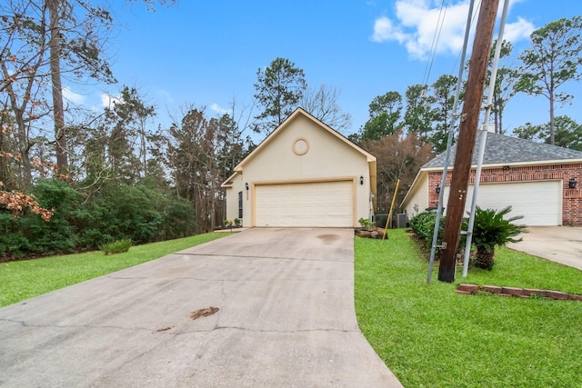 single story home with brick siding, stucco siding, a shingled roof, a garage, and a front lawn