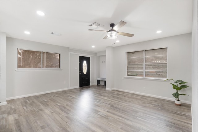 entrance foyer with light wood-type flooring and ceiling fan