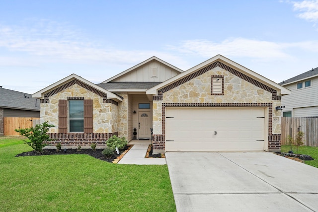 view of front facade with a garage and a front lawn