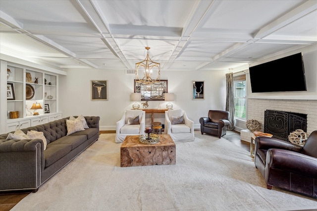 living room featuring coffered ceiling, beamed ceiling, a notable chandelier, and a fireplace