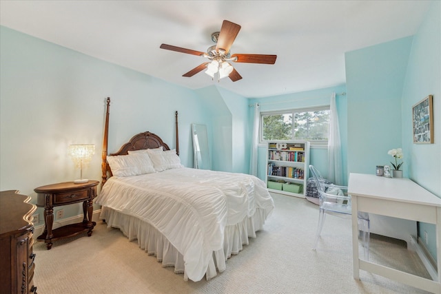 bedroom featuring light colored carpet and ceiling fan