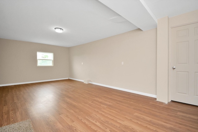 empty room with light wood-type flooring