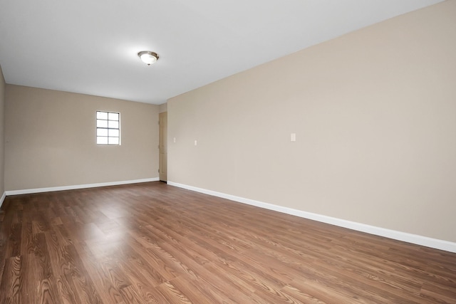 empty room featuring hardwood / wood-style flooring