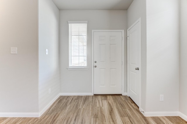 foyer with light hardwood / wood-style flooring