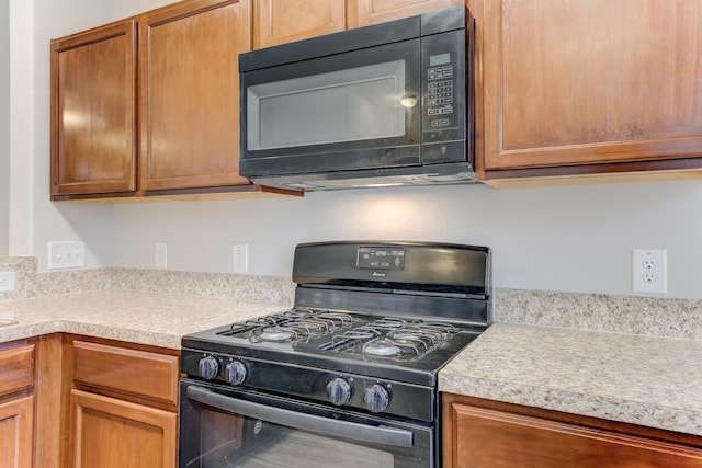 kitchen with black appliances