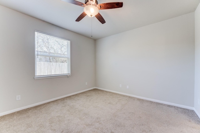 unfurnished room featuring carpet flooring and ceiling fan