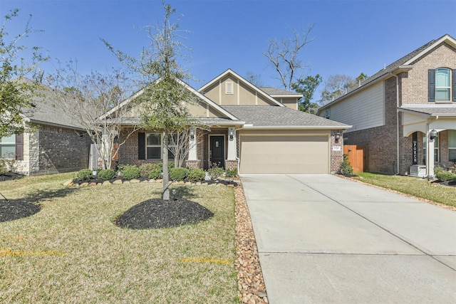 view of front of house featuring a garage and a front yard