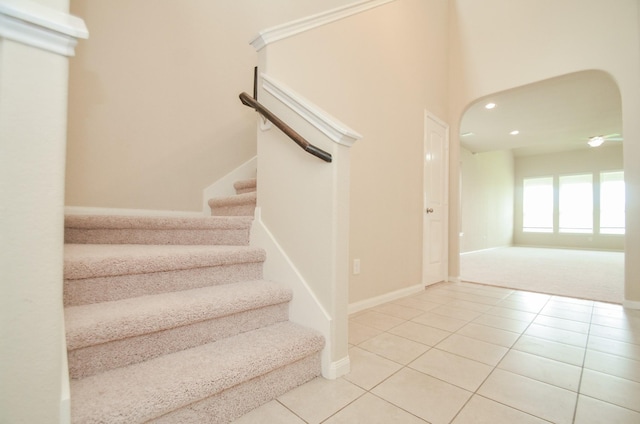 stairs featuring tile patterned floors