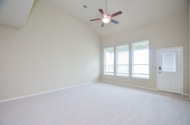 unfurnished room with light carpet, high vaulted ceiling, and ceiling fan