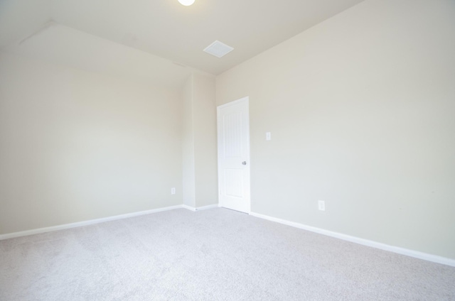 unfurnished room featuring carpet flooring