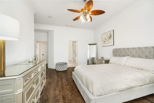 bedroom featuring ceiling fan, ornamental molding, and dark hardwood / wood-style floors