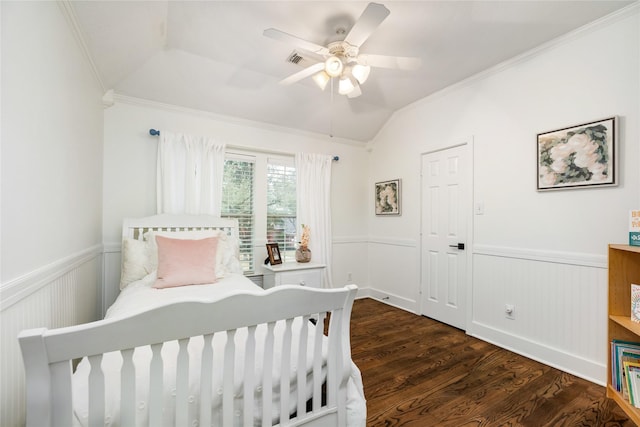 bedroom featuring ceiling fan, ornamental molding, lofted ceiling, and dark hardwood / wood-style flooring