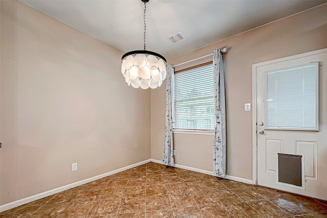 interior space with a notable chandelier