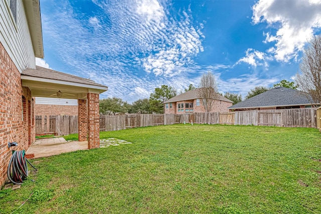 view of yard with a patio area