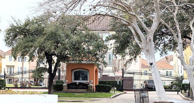 view of property with a fenced front yard