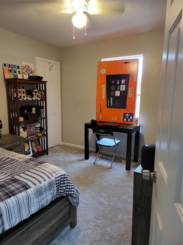 bedroom featuring ceiling fan and carpet flooring