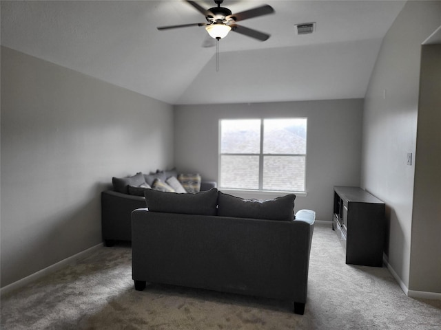 living room featuring carpet floors, lofted ceiling, and ceiling fan