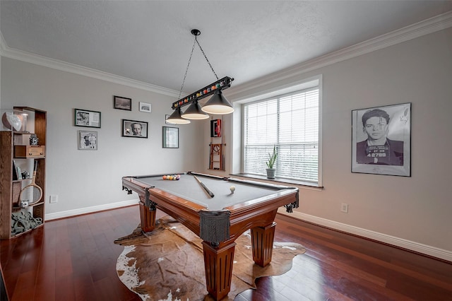 game room featuring dark hardwood / wood-style flooring, pool table, and ornamental molding