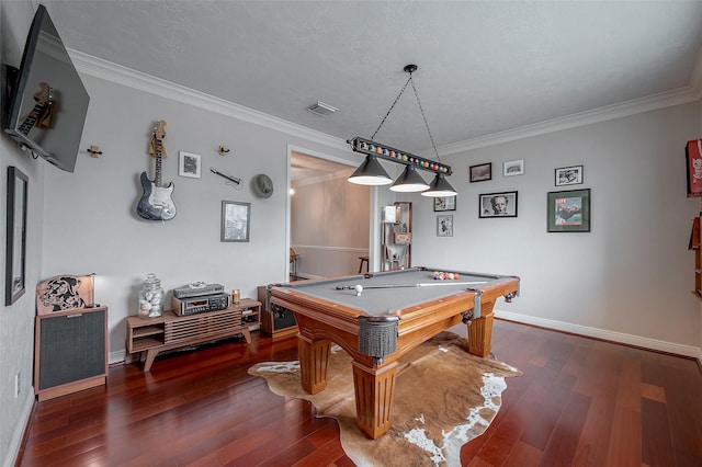 recreation room with crown molding, dark wood-type flooring, pool table, and a textured ceiling