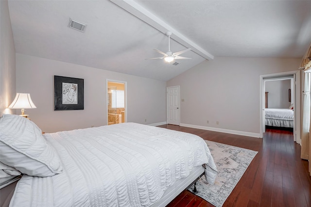 bedroom featuring ceiling fan, vaulted ceiling with beams, connected bathroom, and dark hardwood / wood-style flooring