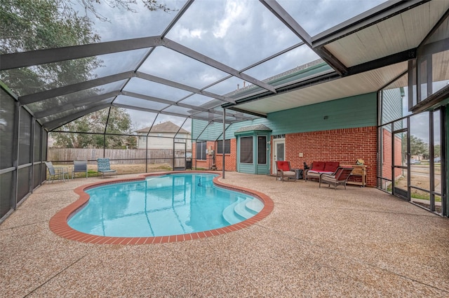 view of pool featuring a patio and a lanai