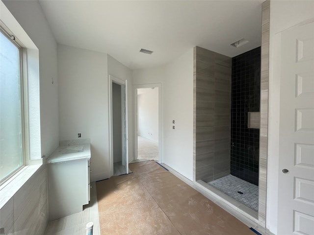 4410 Southpoint Way S, Fulshear, TX 77441 - full bath with baseboards, visible vents, and tiled shower