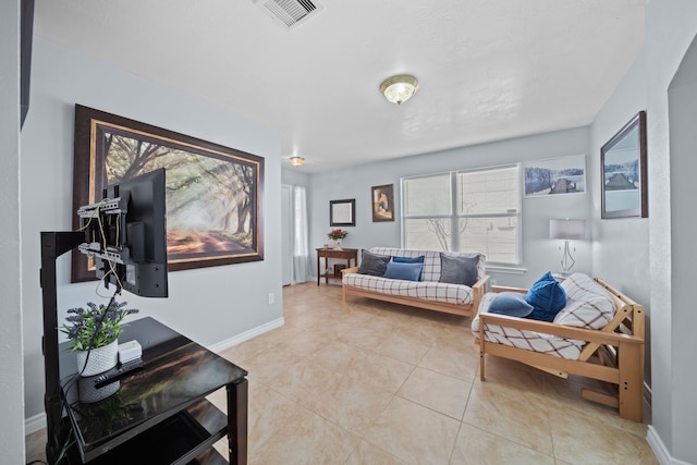 living room with light tile patterned floors