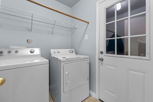 laundry area with independent washer and dryer