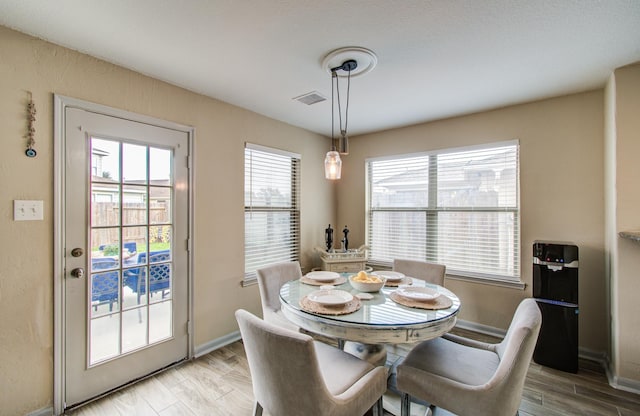 dining room featuring light wood-type flooring