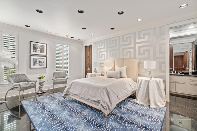 bedroom featuring crown molding