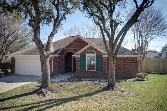 ranch-style home featuring a garage and a front lawn