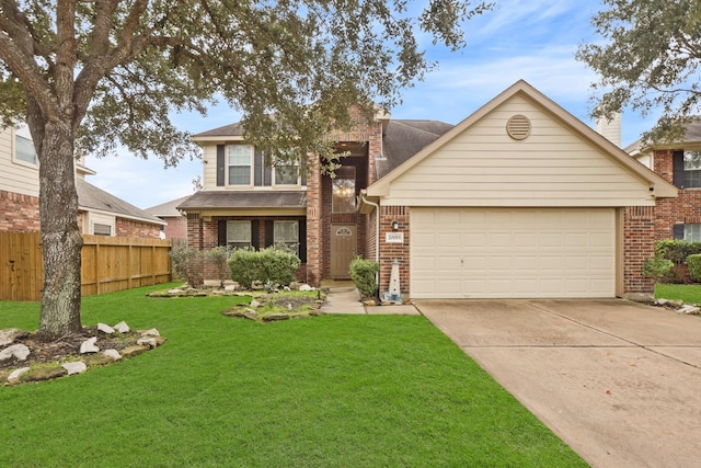 view of front of house with a front lawn and a garage