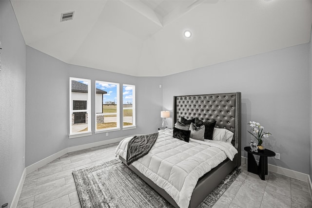 bedroom with vaulted ceiling