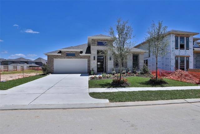 21219 Palm Arbor Dr, Cypress, TX 77433 - view of front of house featuring an attached garage, driveway, and brick siding