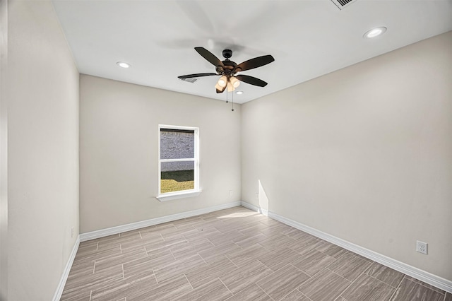 unfurnished room with ceiling fan