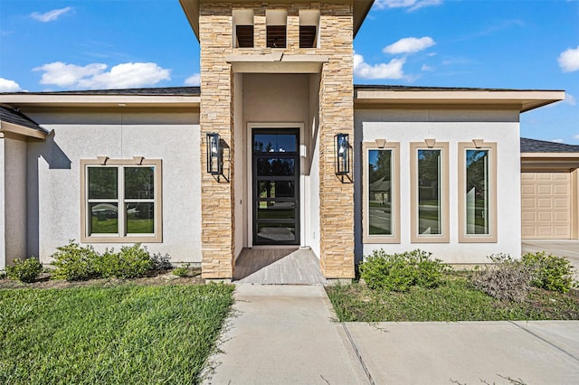 doorway to property featuring a garage