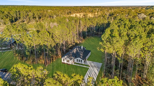 drone / aerial view with a forest view